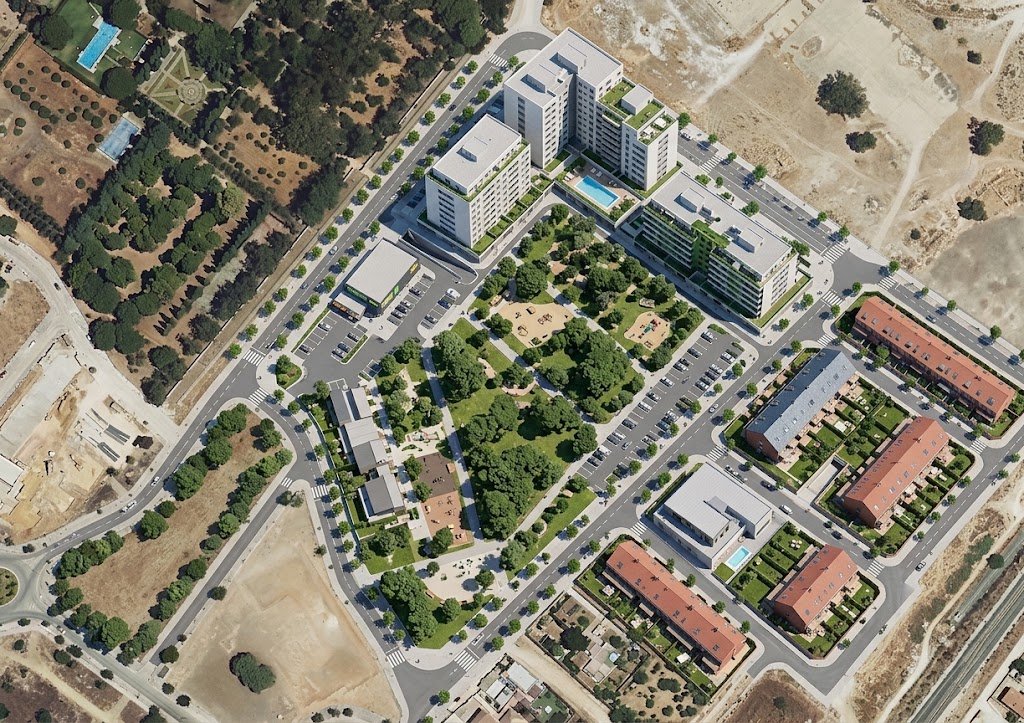 Recreación conceptual en 3D del proyecto urbanístico de la Azucarera San Jerónimo en Jerez, con bloques de pisos, viviendas unifamiliares, zonas verdes y áreas comerciales.
