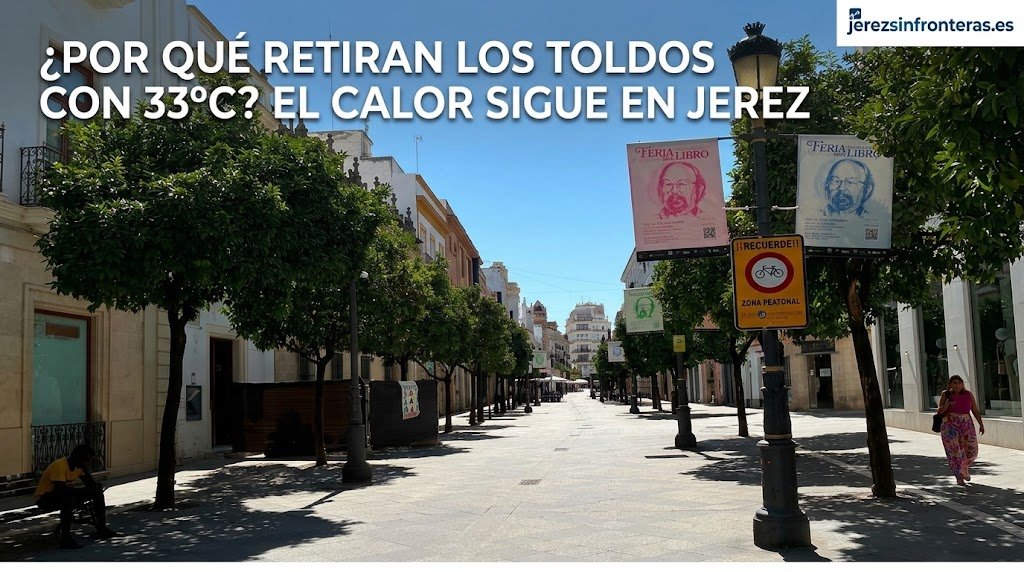 Calle Larga de Jerez soleada tras la retirada de los toldos con el rótulo informativo sobre la polémica de las altas temperaturas